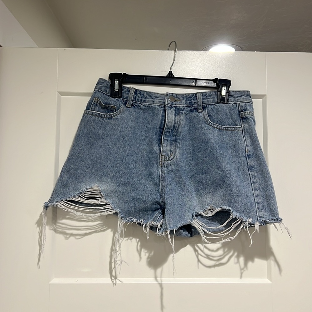 SHEIN Blue distressed jean shorts